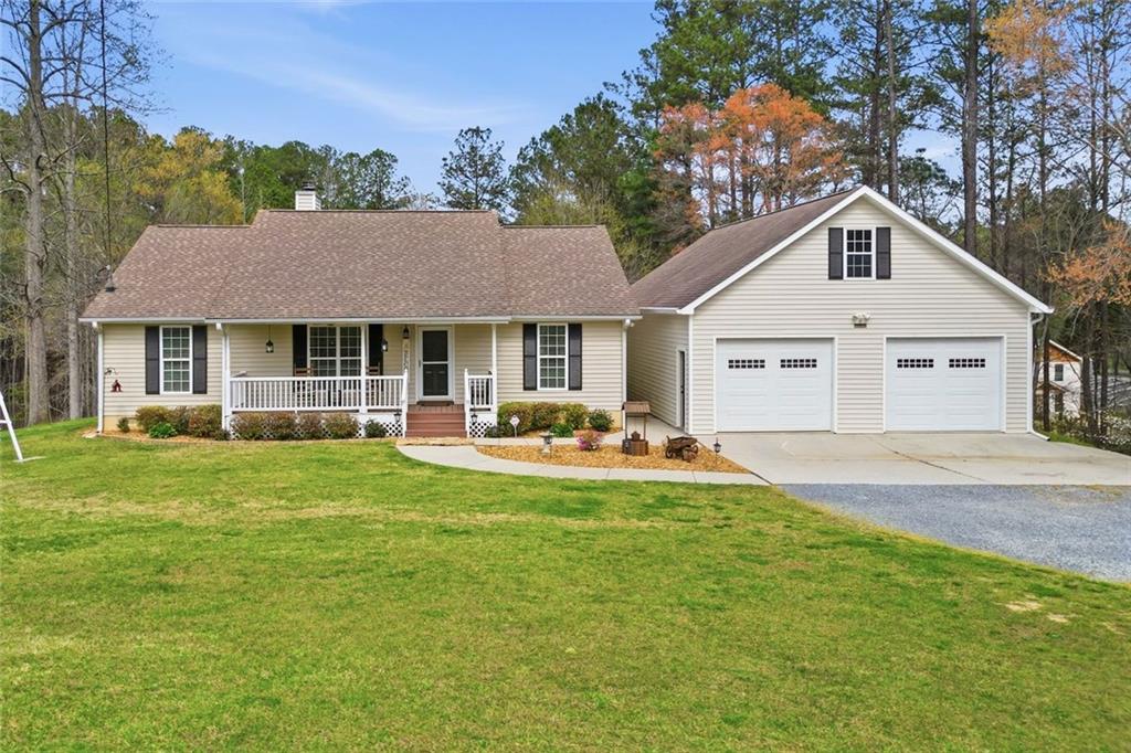 34 Rock Hole Path Dallas, GA 30132 - Photo 1 of 41 a front view of house with yard and green space