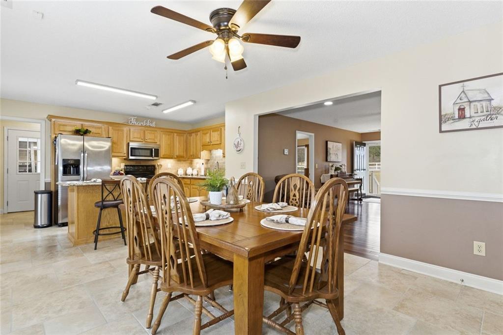 34 Rock Hole Path Dallas, GA 30132 - Photo 12 of 41 a view of a dining area with furniture