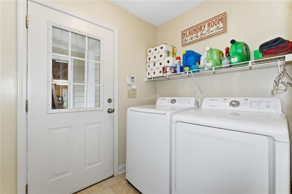 34 Rock Hole Path Dallas, GA 30132 - Photo 16 of 41 a utility room with dryer and washer