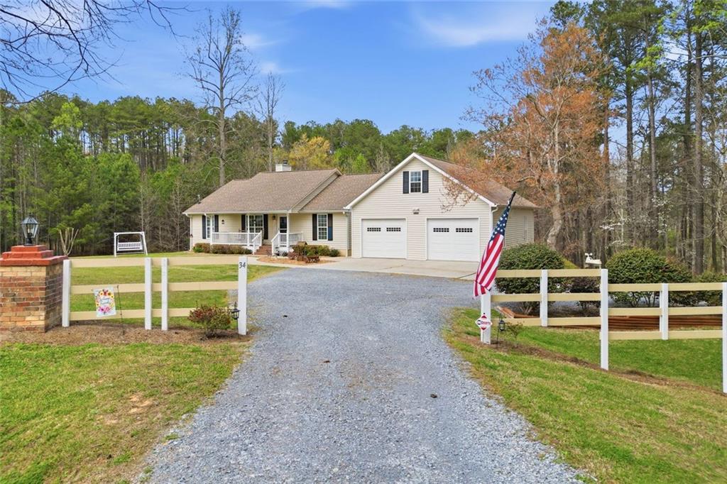 34 Rock Hole Path Dallas, GA 30132 - Photo 2 of 41 a view of a house with a yard