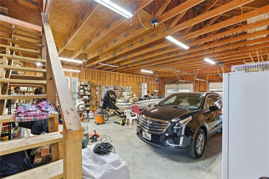 34 Rock Hole Path Dallas, GA 30132 - Photo 32 of 41 a view of parking garage with cars