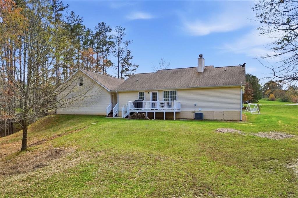 34 Rock Hole Path Dallas, GA 30132 - Photo 35 of 41 a view of a house with a yard
