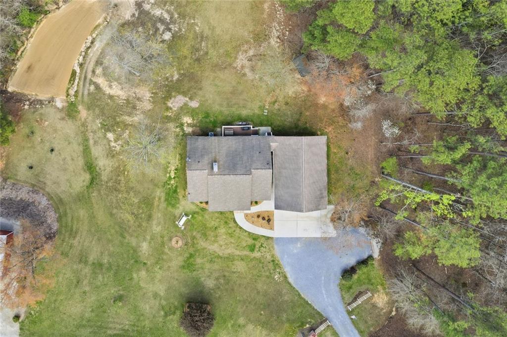 34 Rock Hole Path Dallas, GA 30132 - Photo 40 of 41 an aerial view of a house with a yard