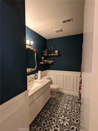 a bathroom with a shower and a sink