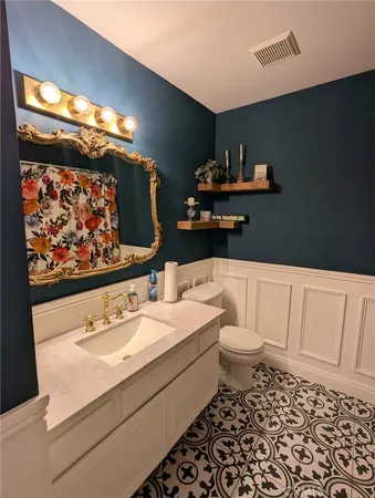 a living room with furniture dining table and a large window