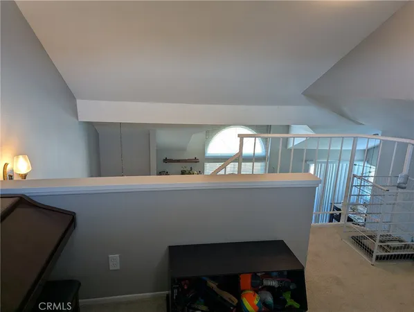 a kitchen with a stove a sink and a microwave