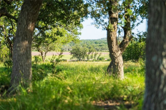 a view of a yard with an outdoor space