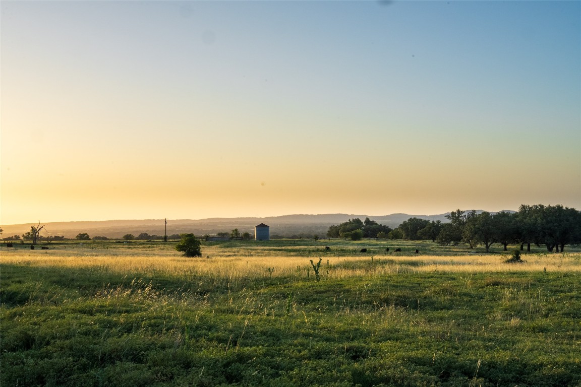 302 Hye-Albert Road Hye, TX 78635 - Photo 2 of 34 a view of a lake with houses in the background