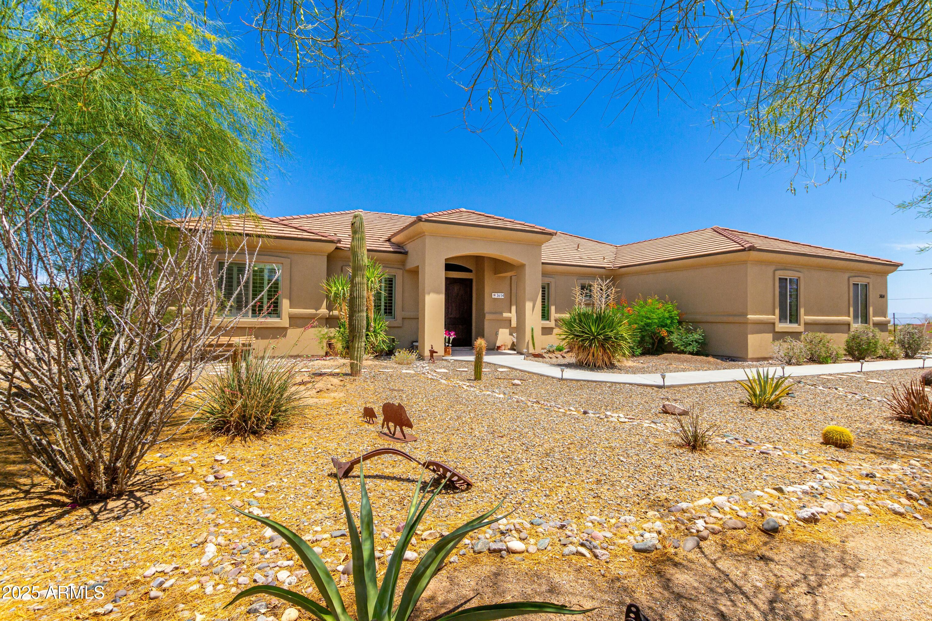 3614 West Phillips Road San Tan Valley, AZ 85144 - Photo 2 of 67 a view of a house with a patio