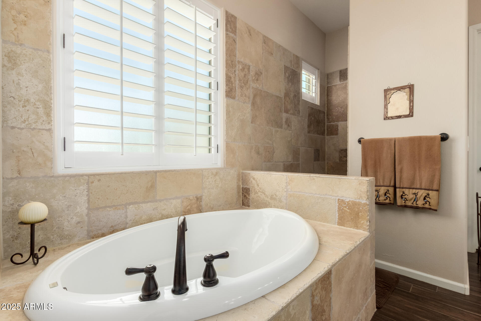 3614 West Phillips Road San Tan Valley, AZ 85144 - Photo 22 of 67 a bathroom with a bathtub and a window