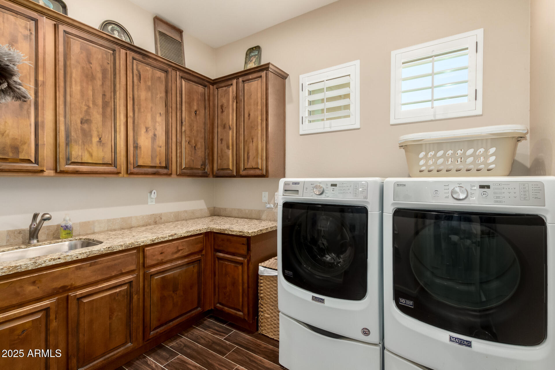 3614 West Phillips Road San Tan Valley, AZ 85144 - Photo 28 of 67 a utility room with sink dryer and washer