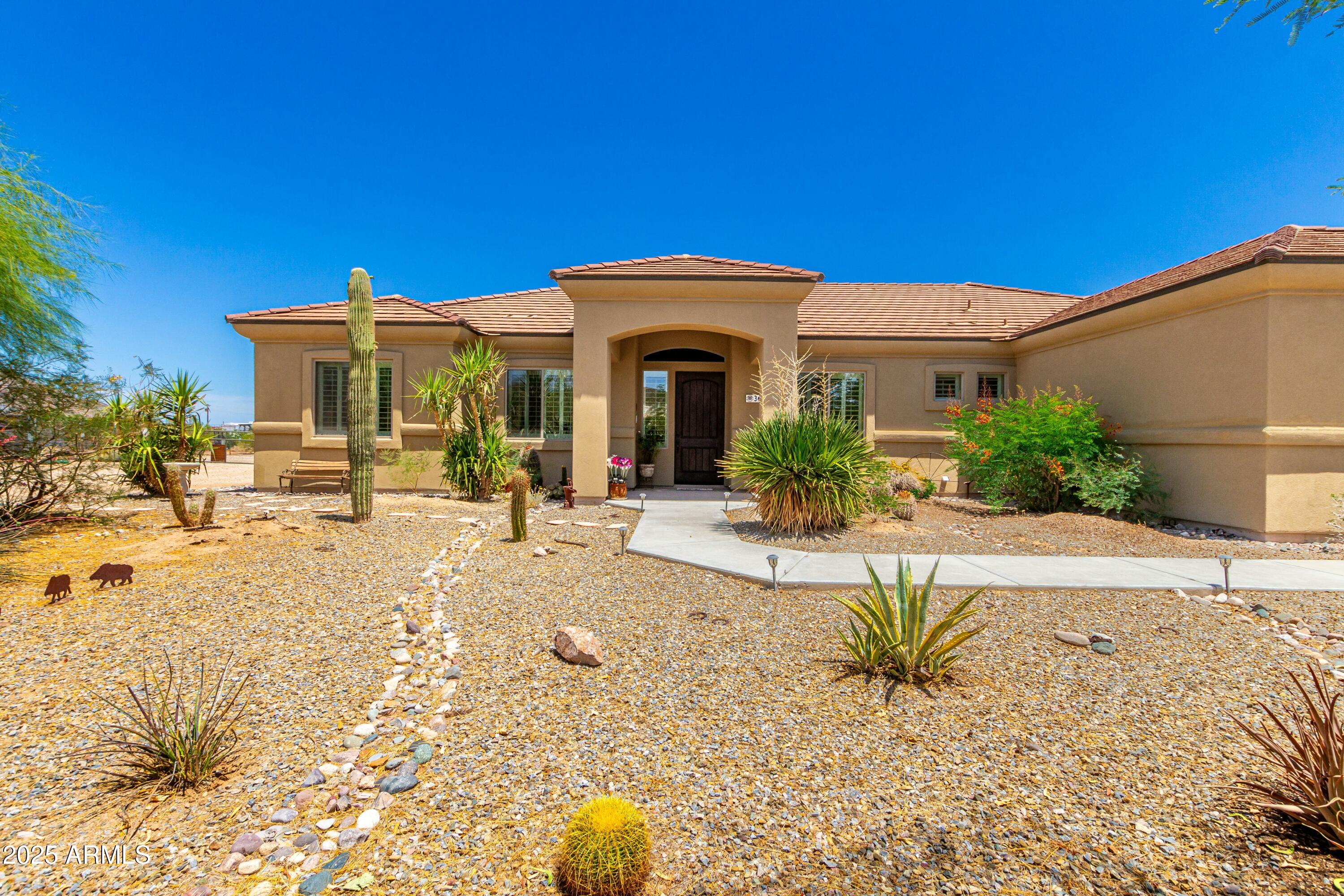 3614 West Phillips Road San Tan Valley, AZ 85144 - Photo 32 of 67 a view of a house with a yard