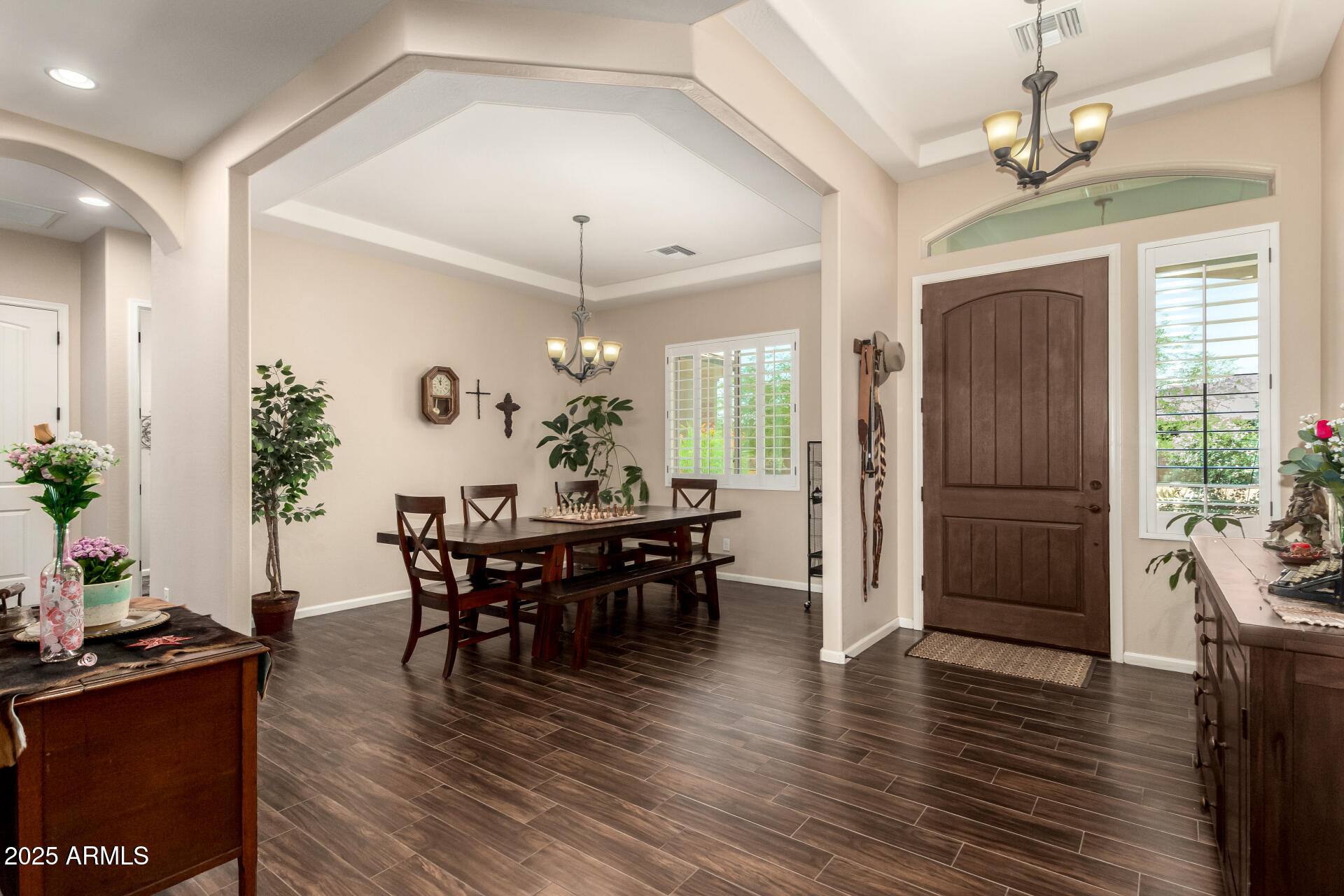 3614 West Phillips Road San Tan Valley, AZ 85144 - Photo 4 of 67 a view of a dining room with furniture and wooden floor