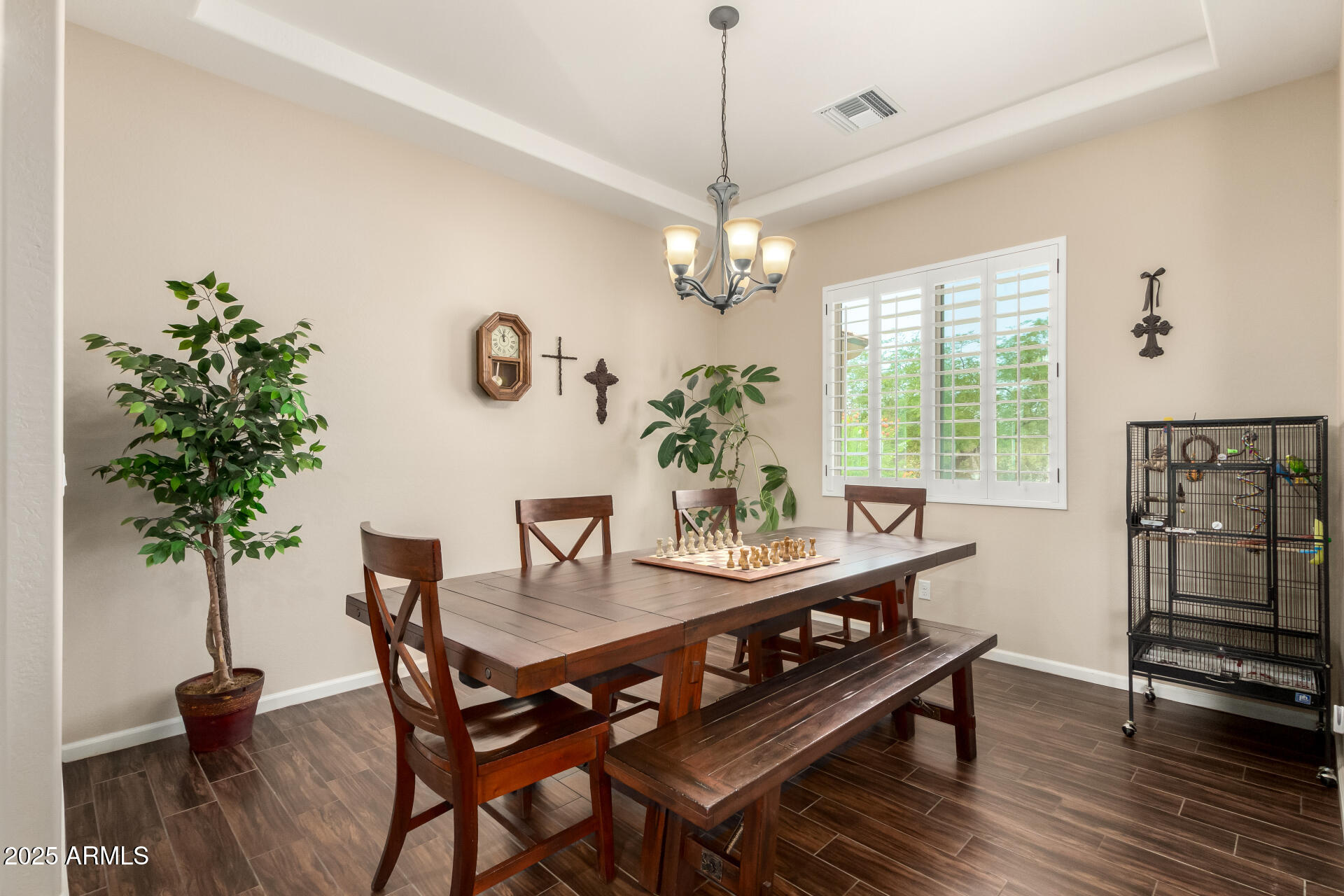 3614 West Phillips Road San Tan Valley, AZ 85144 - Photo 5 of 67 a view of a dining room with furniture window and wooden floor
