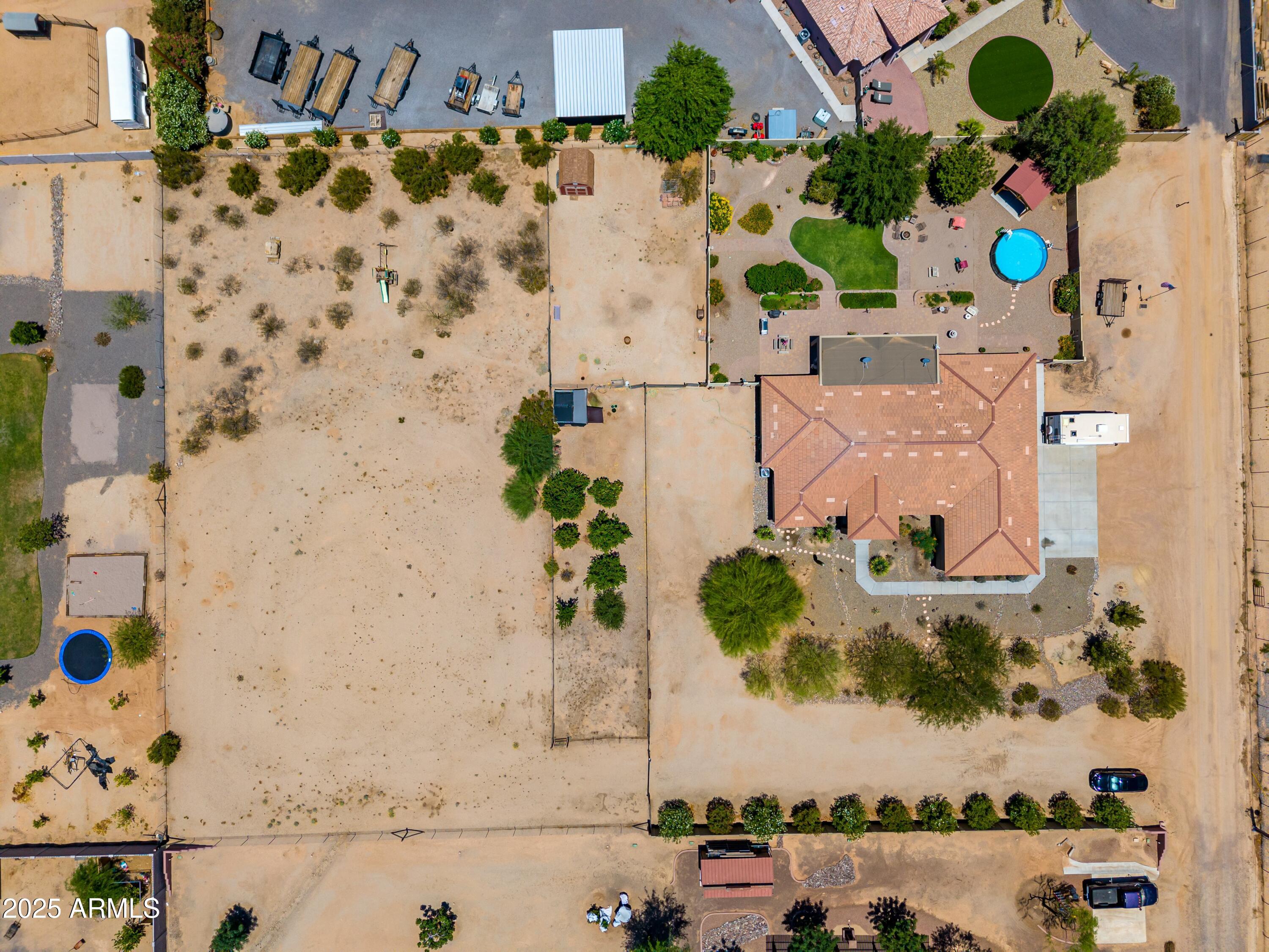 3614 West Phillips Road San Tan Valley, AZ 85144 - Photo 53 of 67 an aerial view of a house with a swimming pool