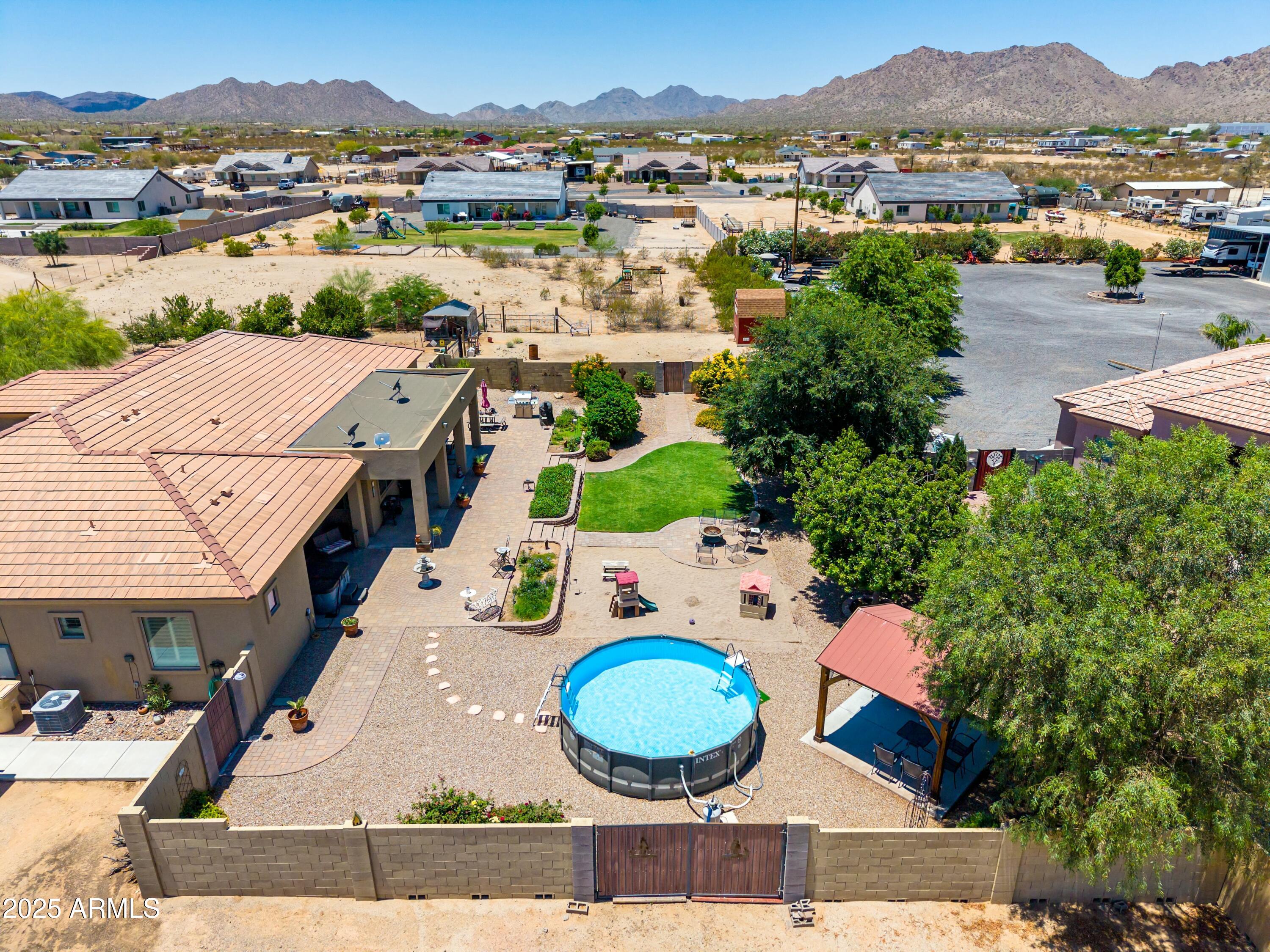 3614 West Phillips Road San Tan Valley, AZ 85144 - Photo 56 of 67 an aerial view of residential houses with outdoor space