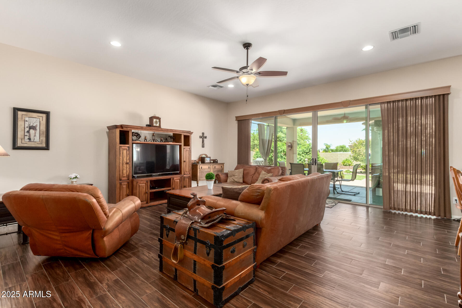 3614 West Phillips Road San Tan Valley, AZ 85144 - Photo 6 of 67 a living room with furniture and a flat screen tv