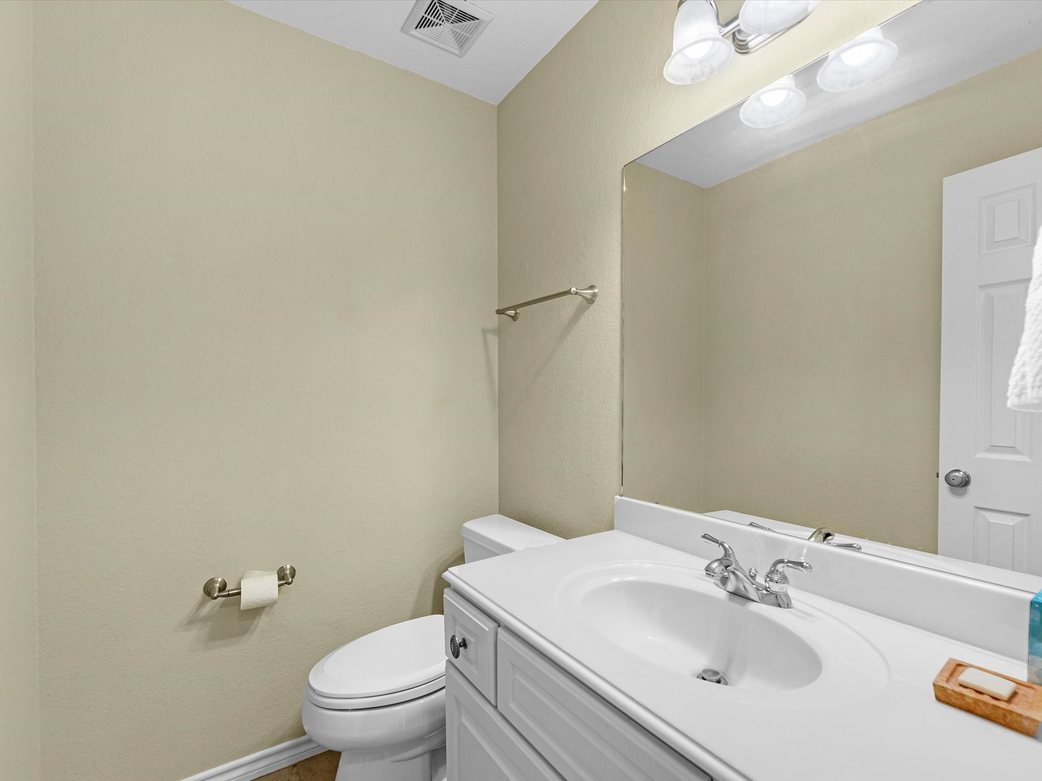 19019 Relay Road Humble, TX 77346 - Photo 19 of 31 a bathroom with a sink toilet and a mirror
