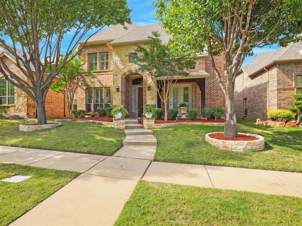 924 Sloan Drive Allen, TX 75013 - Photo 1 of 1 a front view of a house with a yard