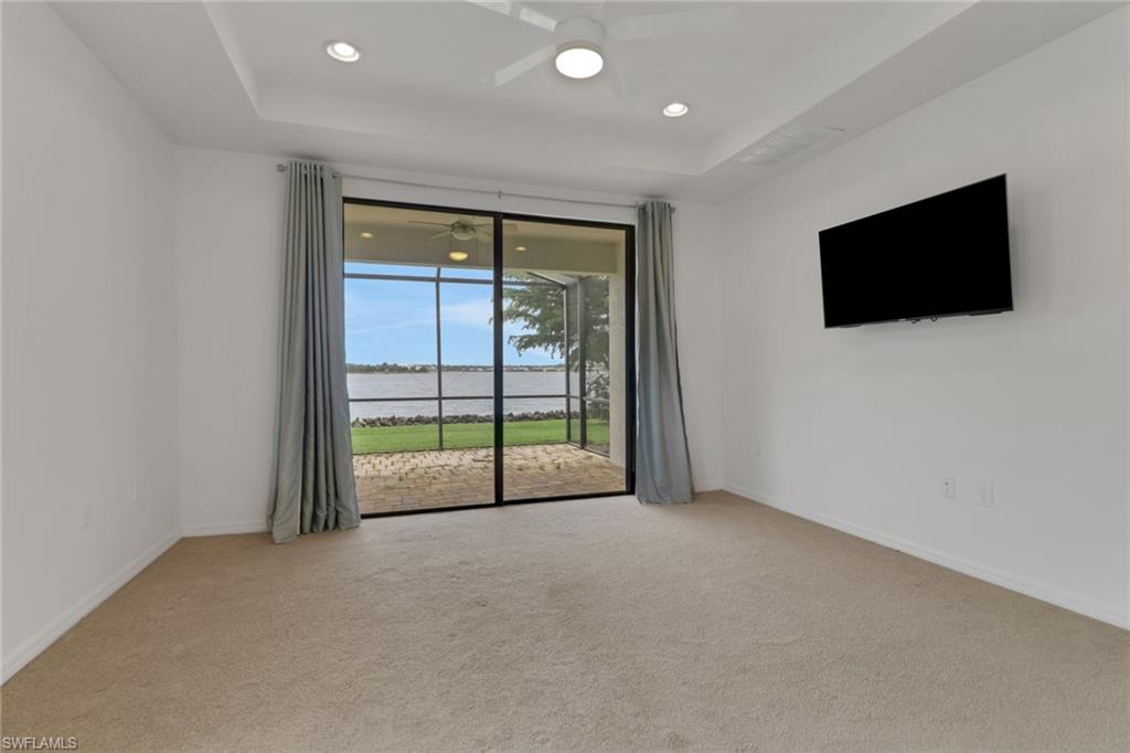 20281 Corkscrew Shores Boulevard Estero, FL 33928 - Photo 11 of 40 a view of an empty room with glass door