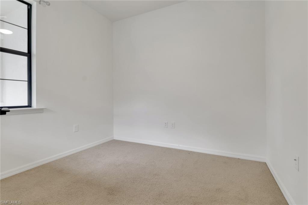 20281 Corkscrew Shores Boulevard Estero, FL 33928 - Photo 17 of 40 a view of an empty room