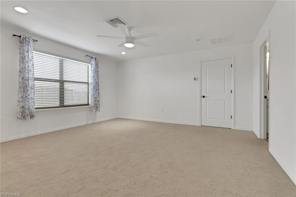 20281 Corkscrew Shores Boulevard Estero, FL 33928 - Photo 19 of 40 a view of an empty room with a window