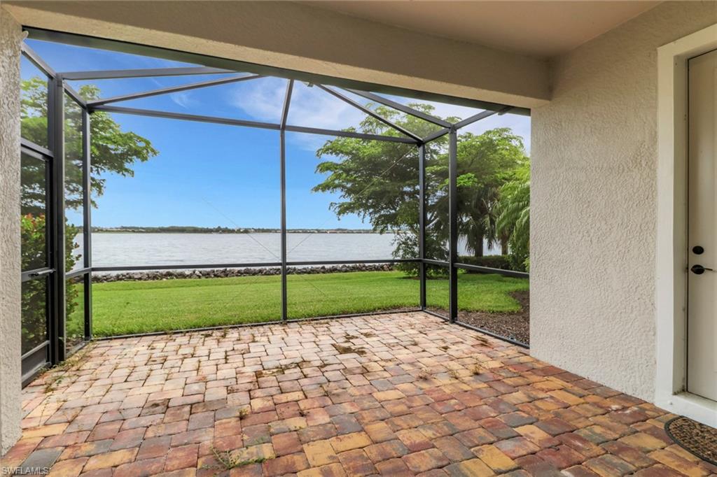 20281 Corkscrew Shores Boulevard Estero, FL 33928 - Photo 25 of 40 a view of a backyard with a garden