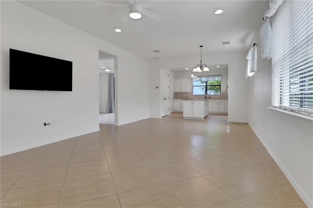 20281 Corkscrew Shores Boulevard Estero, FL 33928 - Photo 6 of 40 a view of a kitchen with a sink and a window