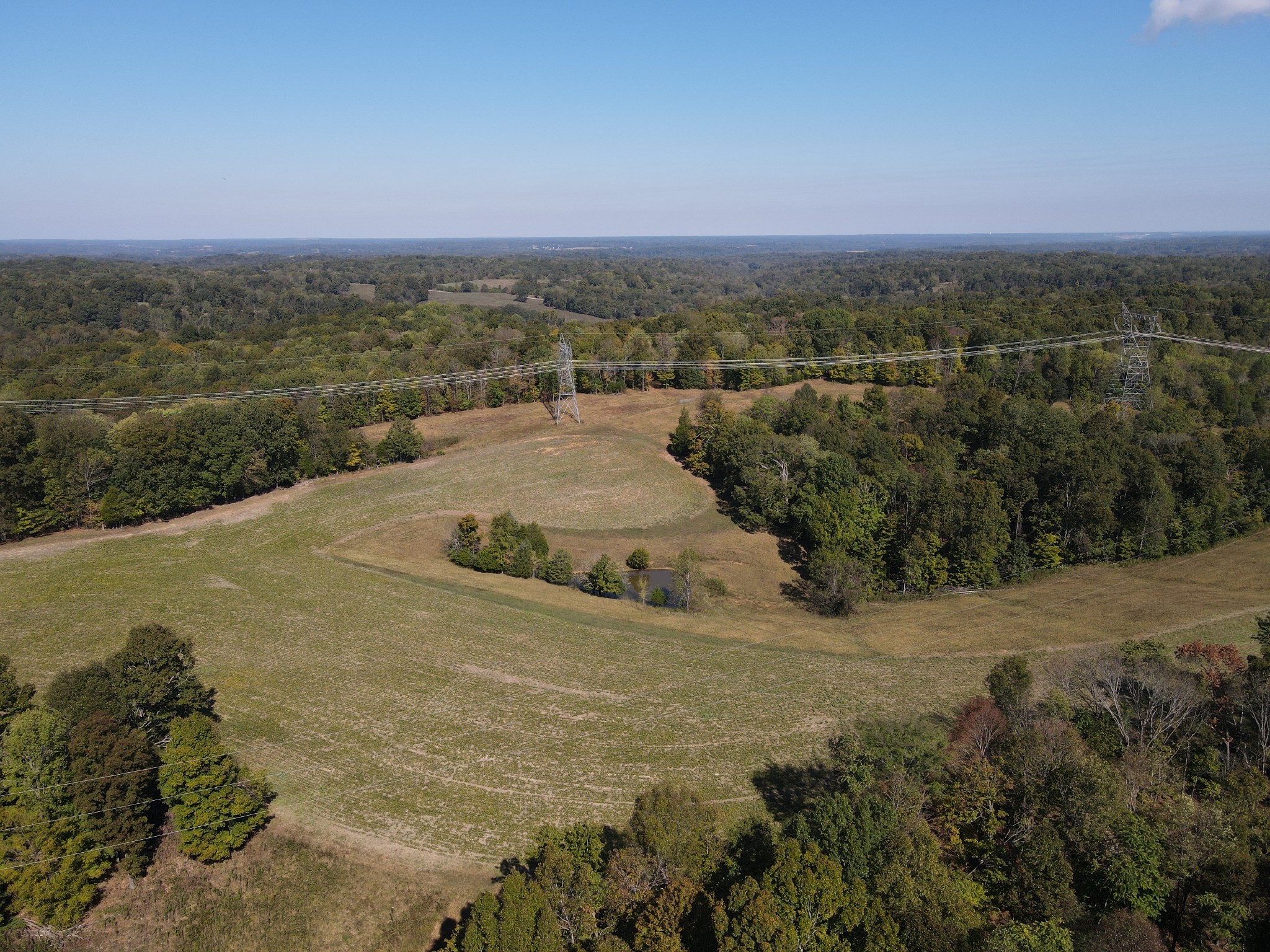 0 Buck Smith Hill Road Palmyra, TN 37142 - Photo 3 of 21 a view of a lake with a city