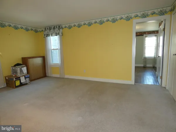 a view of a room with a window