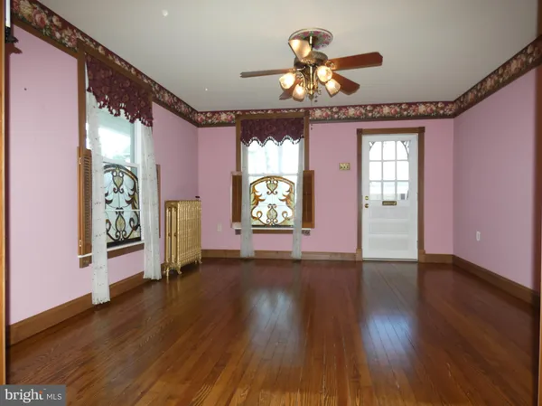 a view of an empty room and window