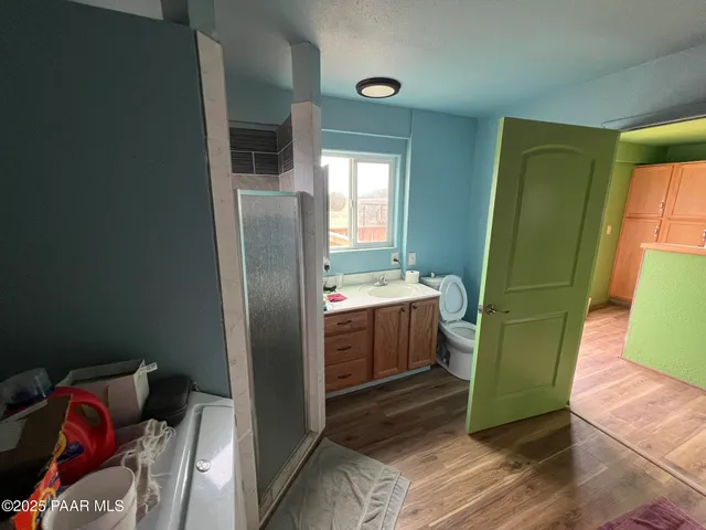 a bathroom with a mirror and a sink