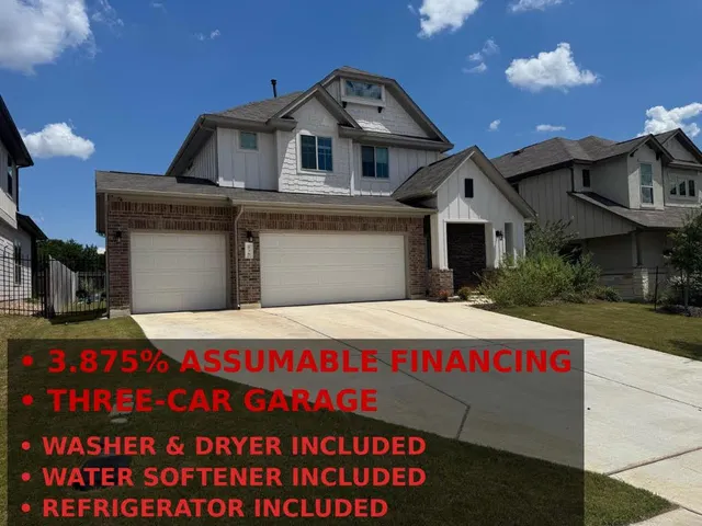 a front view of a house with a garage