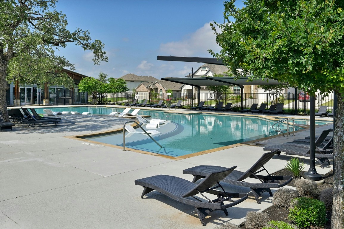 436 Staunton Drive Leander, TX 78641 - Photo 19 of 39 Pool with fence and a patio