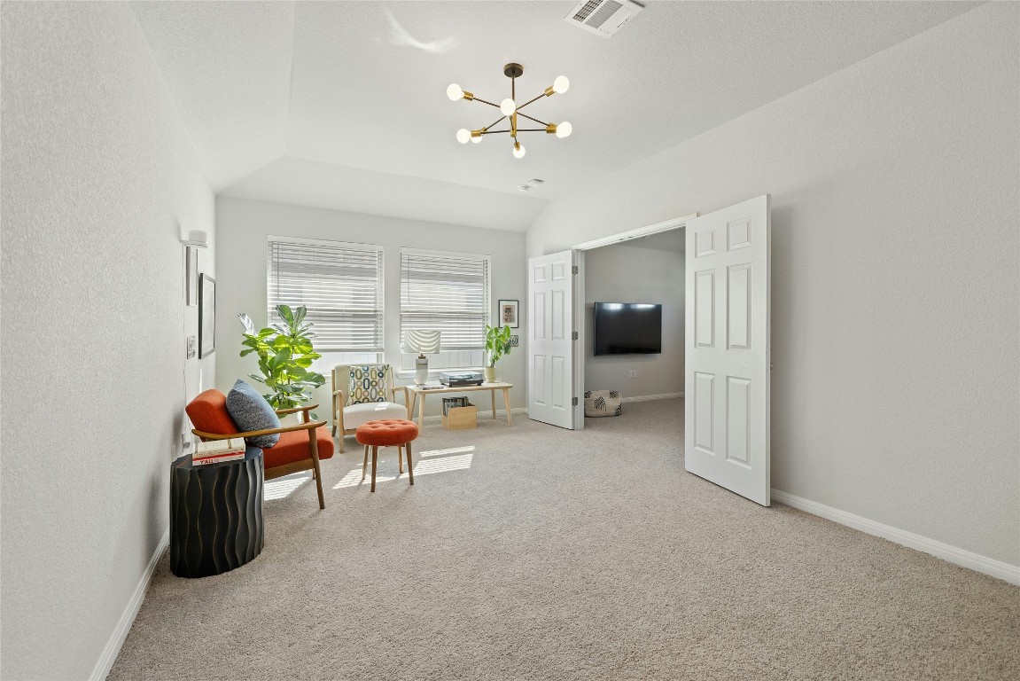 436 Staunton Drive Leander, TX 78641 - Photo 22 of 39 a living room with furniture and a ceiling fan
