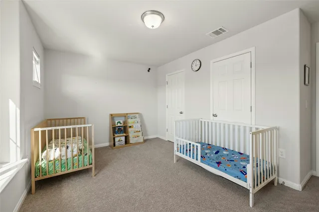 an aerial view of a house with a garden