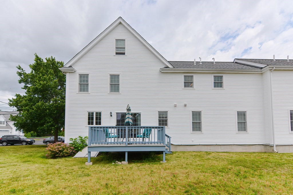 237 Pleasant Street, Unit 237 Norwood, MA 02062 - Photo 35 of 40 a view of a house with swimming pool and porch