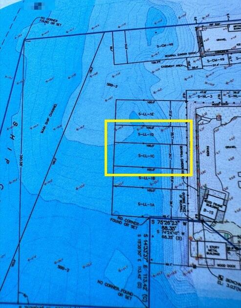 6810 Front Street, Unit SLL1C AND SLL1D Stock Island, FL 33040 - Photo 13 of 25 a room with a chair and table