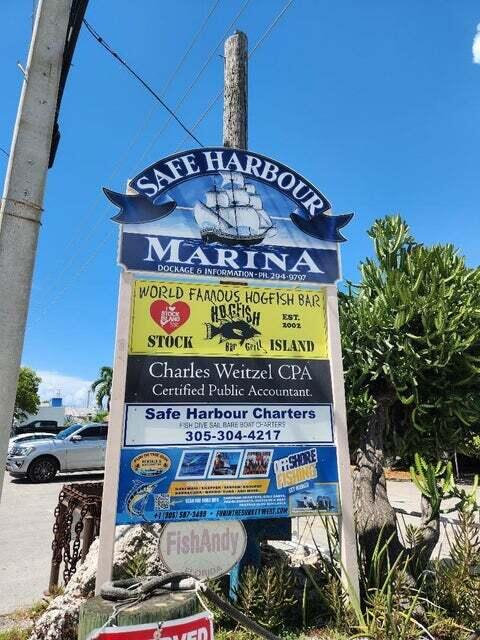 6810 Front Street, Unit SLL1C AND SLL1D Stock Island, FL 33040 - Photo 18 of 25 a sign on the side of a building