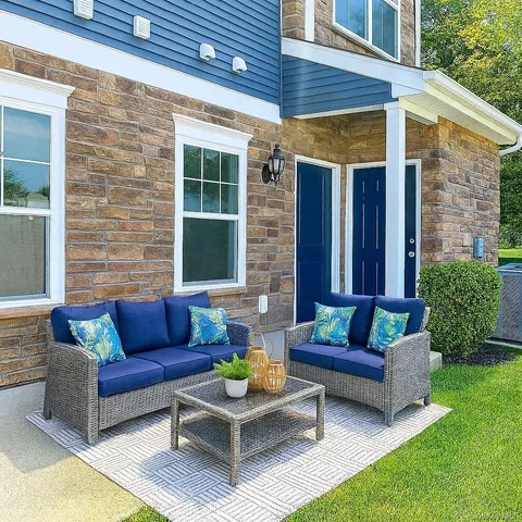 a view of a couches in a patio
