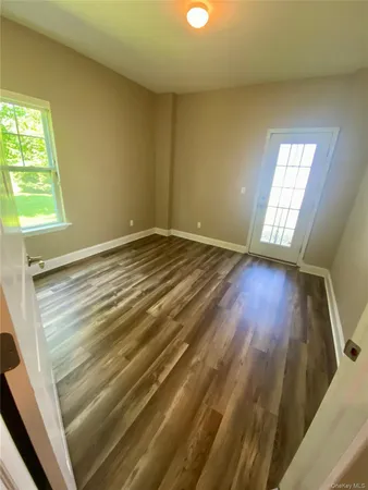 a view of an empty room and window