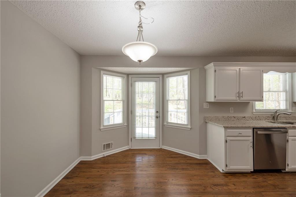 252 Amber Way Dallas, GA 30157 - Photo 8 of 40 a view of a kitchen and window