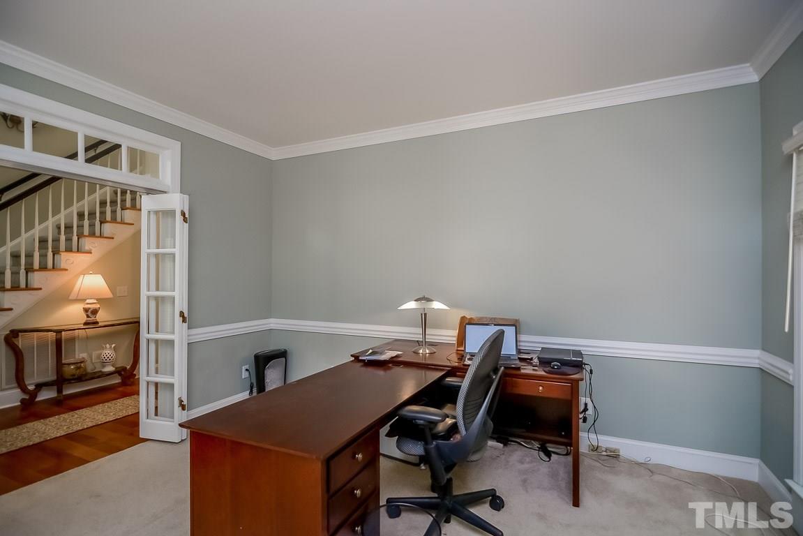 1709 West Paces Ferry Road Raleigh, NC 27613 - Photo 8 of 23 a view of a workspace with furniture