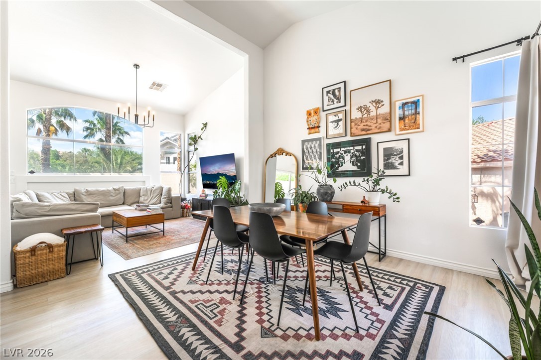 1941 Ivy Point Lane Las Vegas, NV 89134 - Photo 3 of 21 This naturally illuminated living and dining area boasts high ceilings and ample space for comfortable living.