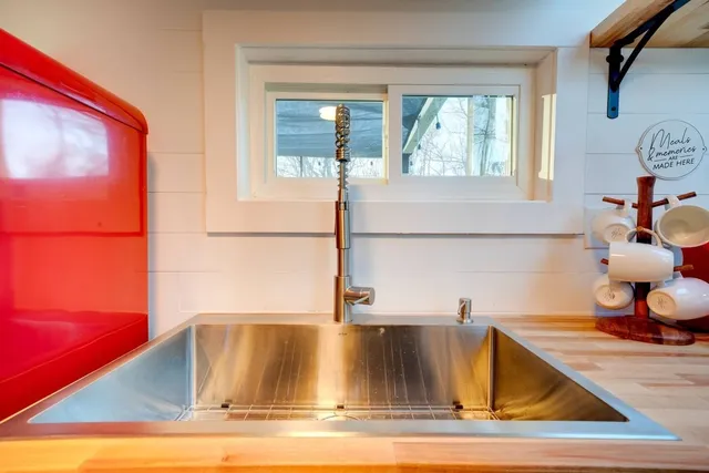 a view of a living room with a wooden floor