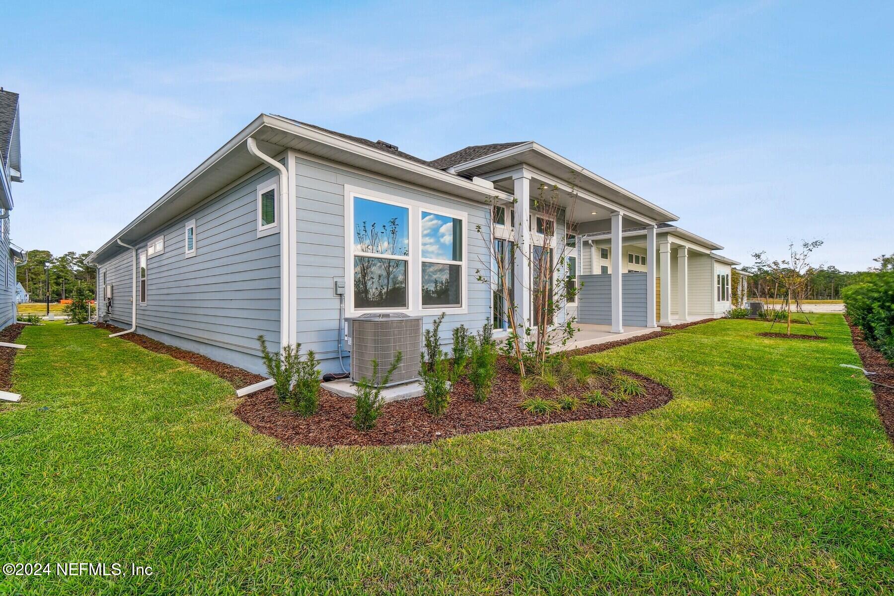 5608 Pathfinder Road Jacksonville, FL 32224 - Photo 35 of 36 a house view with a garden space
