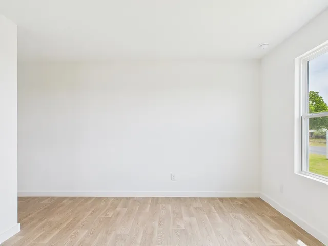 an empty room with windows