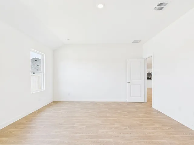 a bathroom with a shower sink and vanity