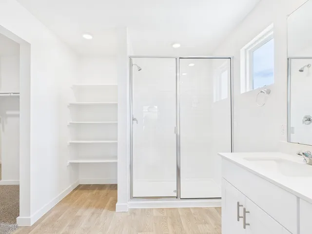 a view of an empty walk in closet