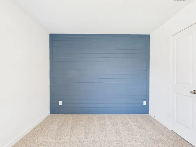 a view of an empty room with window